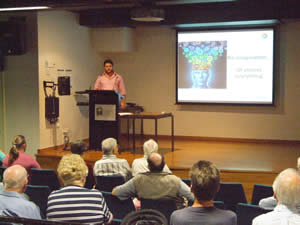 Sam addresses the audience