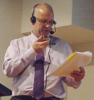 Derrick using the dictation machine