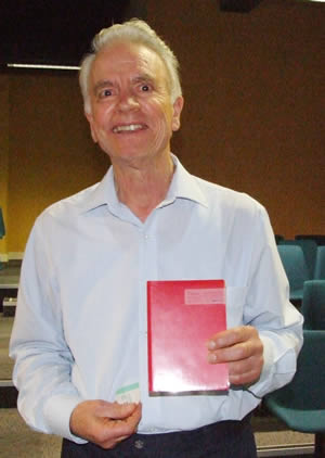 Frank with a sandisk note pad